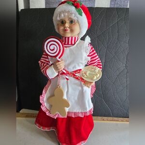 Mrs. Claus Baking Gingerbread. with Candy Cane and Gingerbread